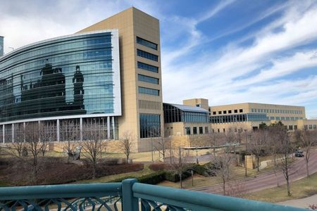 FILE PHOTO: The Minneapolis Federal Reserve bank is pictured in Minneapolis, Minnesota, U.S., April 9, 2019. REUTERS/Howard Schneider/File Photo 