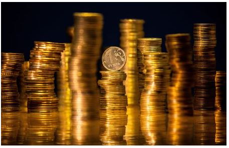 FILE PHOTO: A view shows Russian rouble coins in this illustration picture taken March 25, 2021