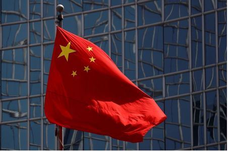 The Chinese national flag is seen in Beijing, China April 29, 2020. REUTERS/Thomas Peter