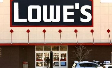 A view of the sign outside the Lowes store in Westminster, Colorado February 26, 2014. REUTERS/Rick Wilking/File Photo