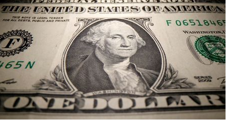 A U.S. Dollar banknote is seen in this illustration taken May 26, 2020. REUTERS/Dado Ruvic/Illustration