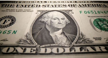 A U.S. Dollar banknote is seen in this illustration taken May 26, 2020. REUTERS/Dado Ruvic/Illustration