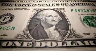 A U.S. dollar banknote is seen in this illustration taken May 26, 2020. REUTERS/Dado Ruvic/Illustration/File Photo 