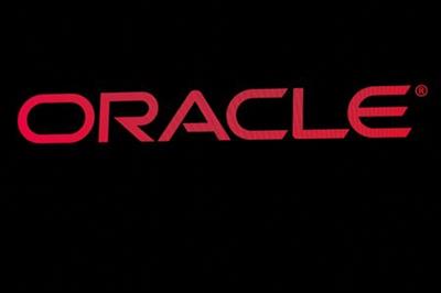 The company logo for Oracle Corp. is displayed on a screen on the floor at the New York Stock Exchange (NYSE) in New York, U.S., September 18, 2019. REUTERS/Brendan McDermid/File Photo